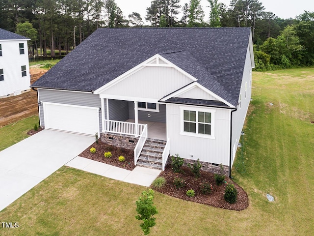 490 Barbour Farm Ln, Four Oaks, NC 27524 - view of front facade with roof with shingles, crawl space, covered porch, and a front lawn