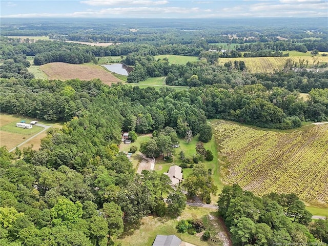 birds eye view of property featuring a rural view