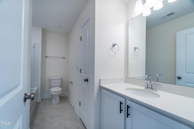 bathroom featuring visible vents, baseboards, toilet, vanity, and tile patterned flooring