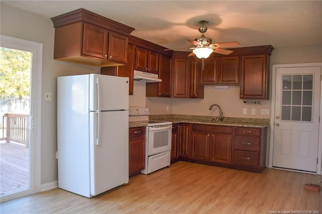 kitchen featuring white appliances, sink, light hardwood / wood-style flooring, ceiling fan, and light stone countertops