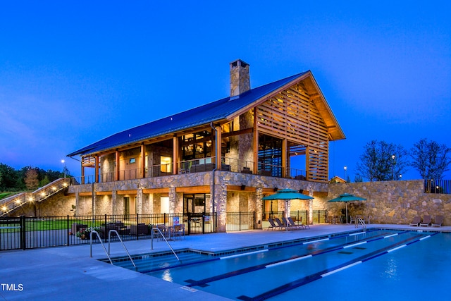 view of pool featuring a patio