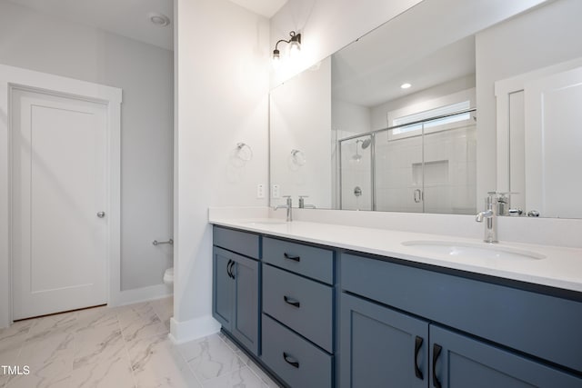 bathroom featuring vanity, toilet, and walk in shower