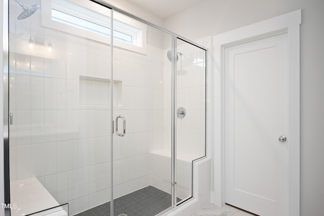 bathroom featuring walk in shower