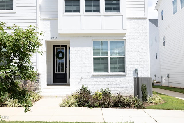 property entrance with central air condition unit