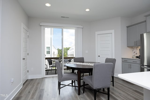 dining room featuring light hardwood / wood-style floors