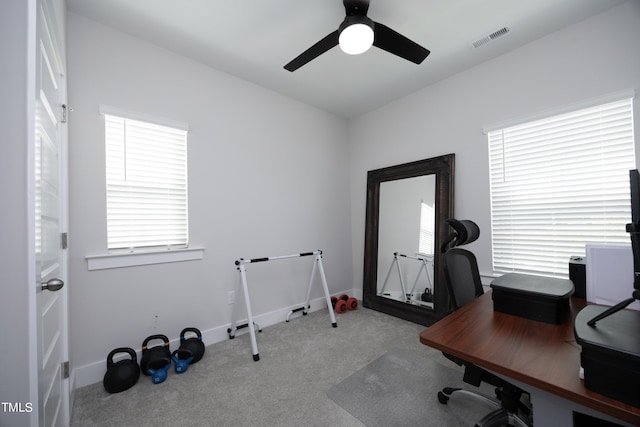 office area with carpet floors and ceiling fan