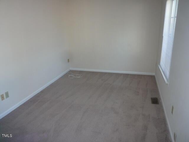 8220 Mcguire Dr, Raleigh, NC 27616 - empty room with carpet flooring, baseboards, and visible vents