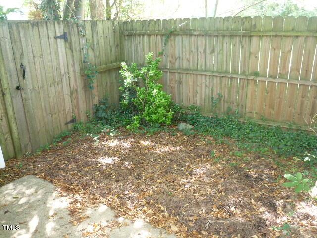 8220 Mcguire Dr, Raleigh, NC 27616 - view of yard with a fenced backyard