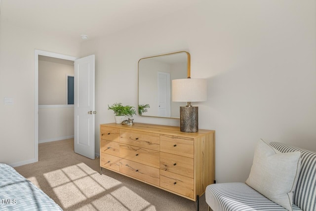 bedroom with light colored carpet