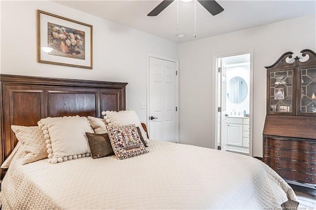 bedroom with ensuite bathroom and ceiling fan