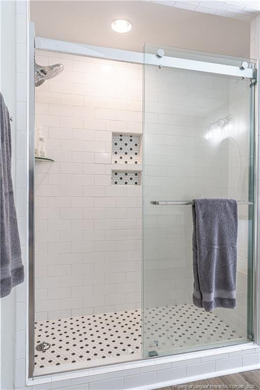 bathroom featuring a stall shower