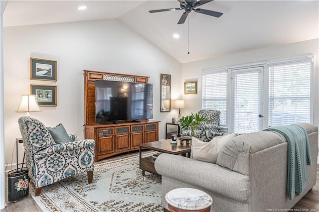 living room with ceiling fan, light wood-style flooring, vaulted ceiling, and recessed lighting