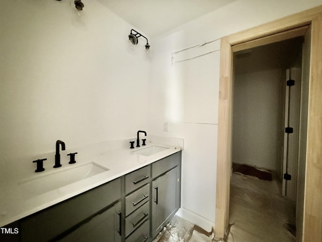 bathroom with double vanity and a sink