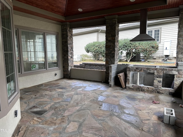 sunroom / solarium with vaulted ceiling