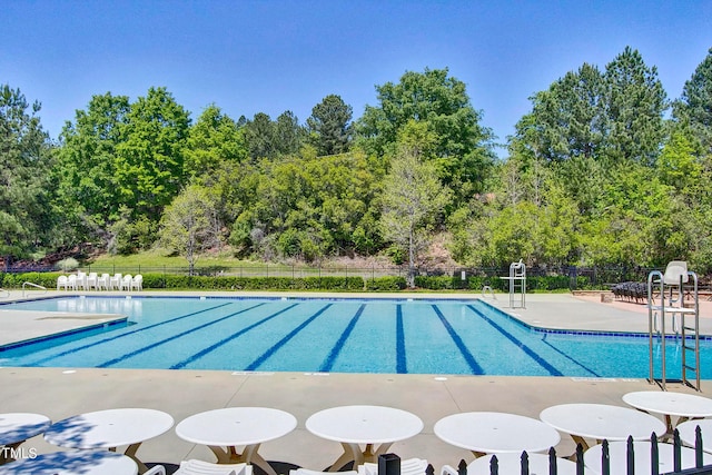 view of pool with a patio