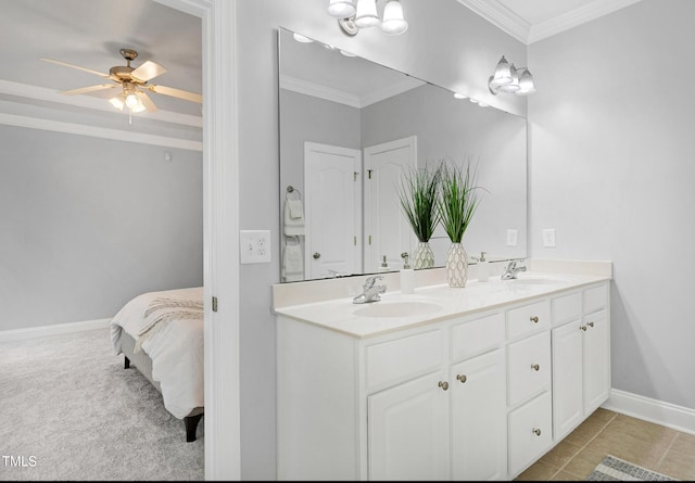 bathroom featuring ceiling fan, vanity, tile patterned flooring, and ornamental molding