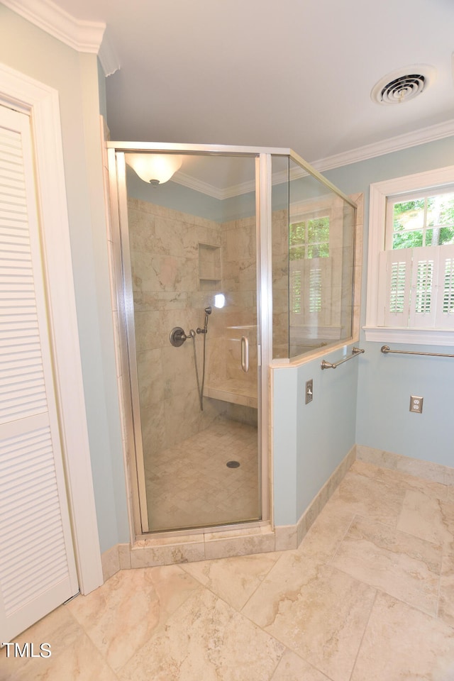 bathroom featuring walk in shower and crown molding