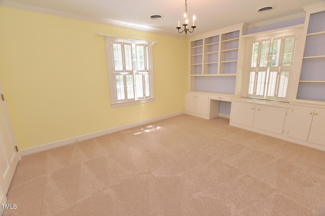 carpeted empty room with ornamental molding and an inviting chandelier