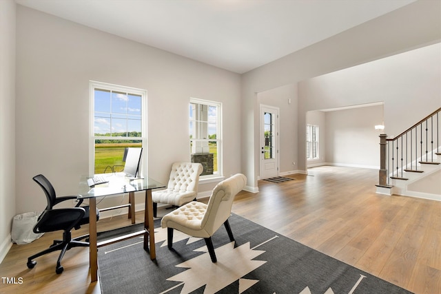 home office with light wood-type flooring