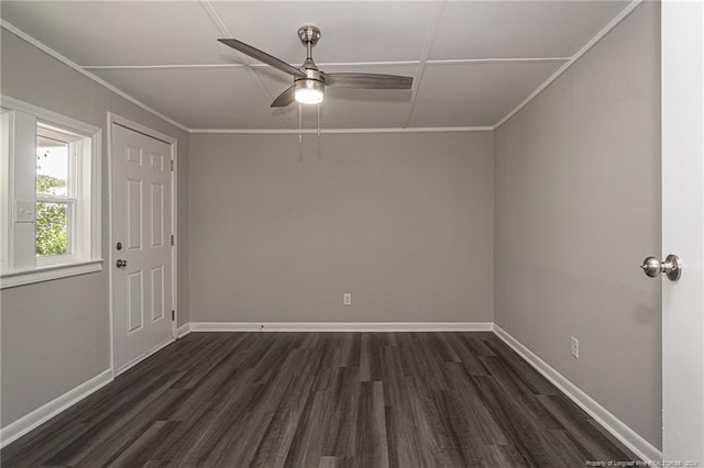 111 Sanford Rd, Laurinburg, NC 28352 - spare room with ornamental molding, baseboards, dark wood-style floors, and a ceiling fan