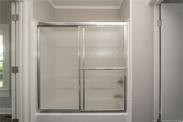 111 Sanford Rd, Laurinburg, NC 28352 - bathroom with a shower with shower door and ornamental molding