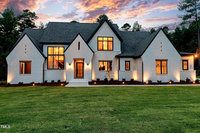 view of front of home featuring a yard