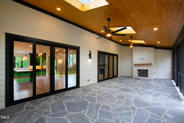 interior space featuring ceiling fan