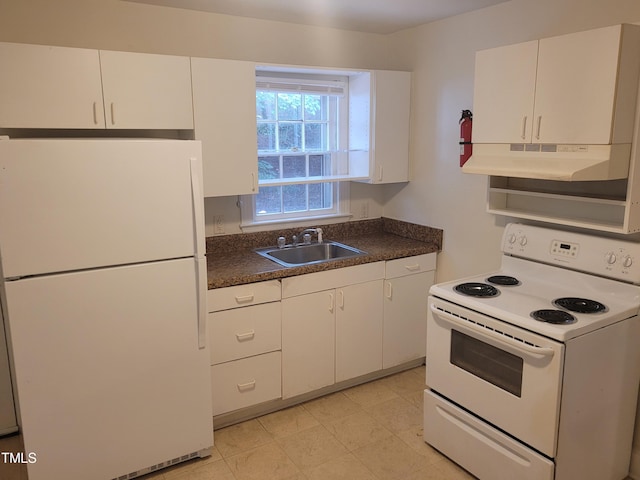 kitchen featuring white cabinets, sink, and white appliances