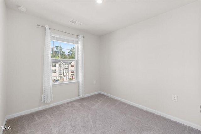 empty room featuring carpet floors