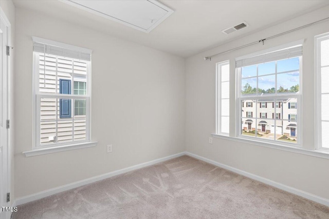 view of carpeted spare room