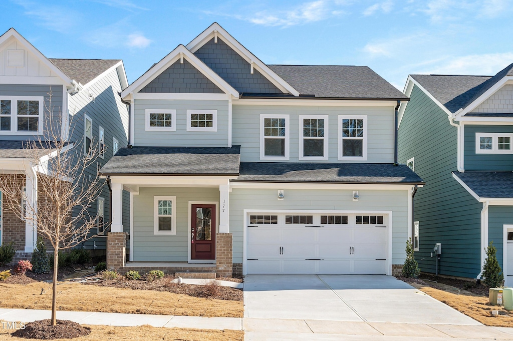 craftsman house with a garage