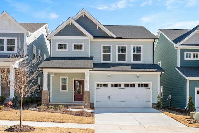 craftsman house with a garage