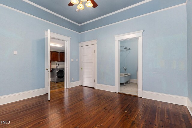 unfurnished bedroom with washer / clothes dryer, ceiling fan, crown molding, and dark hardwood / wood-style flooring