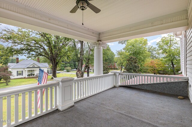 view of patio featuring ceiling fan