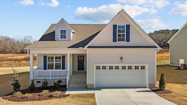 view of front of property featuring a porch and a garage