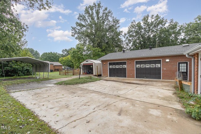 garage with a carport