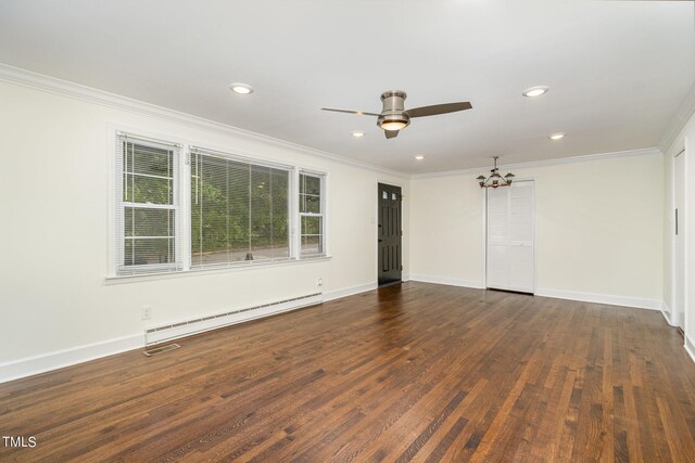 empty room featuring crown molding, dark hardwood / wood-style flooring, ceiling fan with notable chandelier, and a baseboard heating unit