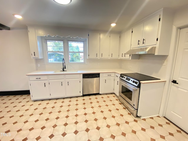 kitchen featuring white cabinetry, sink, and appliances with stainless steel finishes