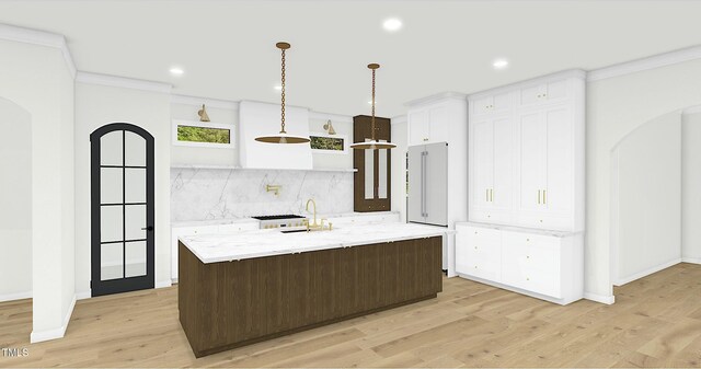 kitchen with a large island, crown molding, white cabinets, decorative backsplash, and light wood-type flooring