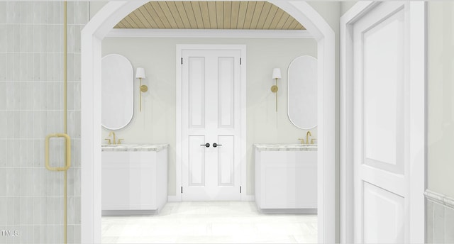 hall with crown molding and sink