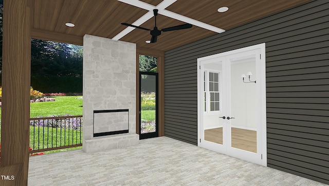 view of patio featuring ceiling fan and french doors