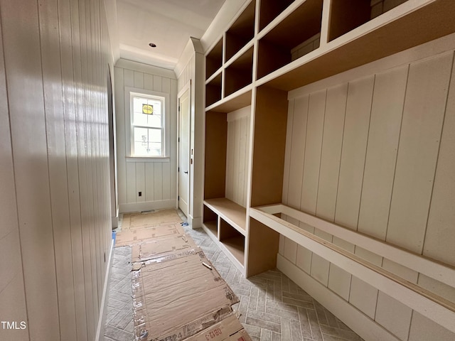 mudroom featuring baseboards