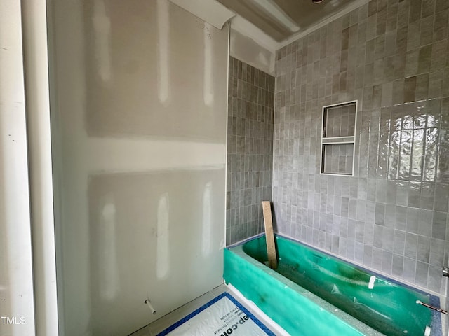 bathroom with walk in shower and a bathtub
