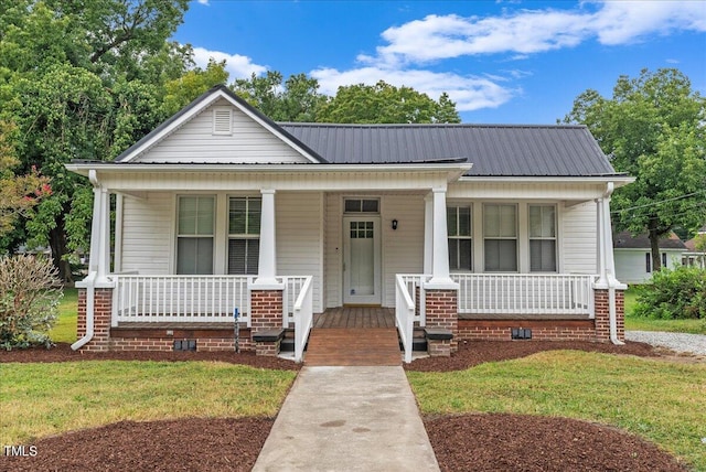 bungalow featuring a front yard and a porch