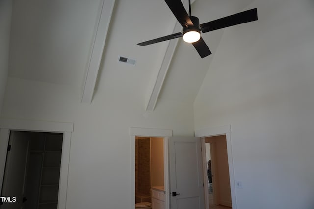 details featuring visible vents, a ceiling fan, and beamed ceiling