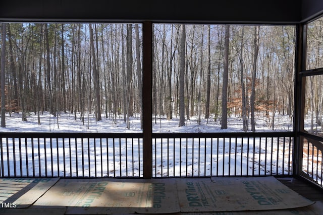 view of snow covered deck