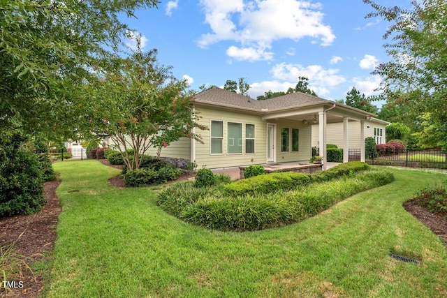 108 Boone St, Chapel Hill, NC 27516 - view of side of property with a yard, a patio, fence, and a ceiling fan