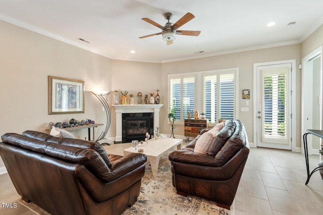 108 Boone St, Chapel Hill, NC 27516 - living area featuring a ceiling fan, a glass covered fireplace, ornamental molding, and visible vents