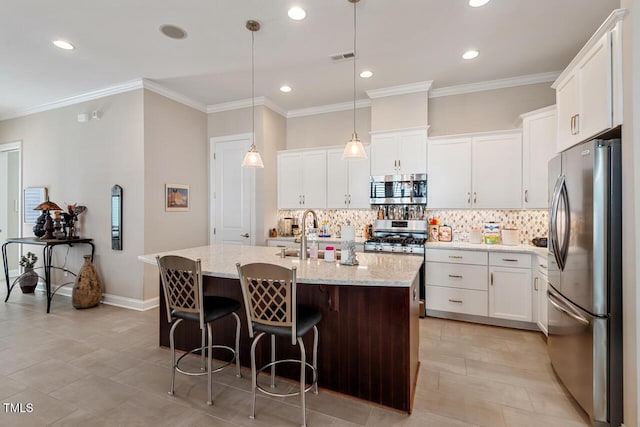 108 Boone St, Chapel Hill, NC 27516 - kitchen with backsplash, stainless steel appliances, and white cabinets