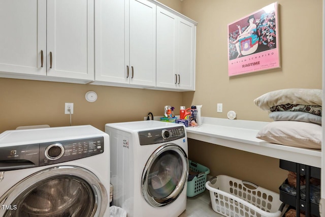 108 Boone St, Chapel Hill, NC 27516 - laundry area with washer and dryer and cabinet space